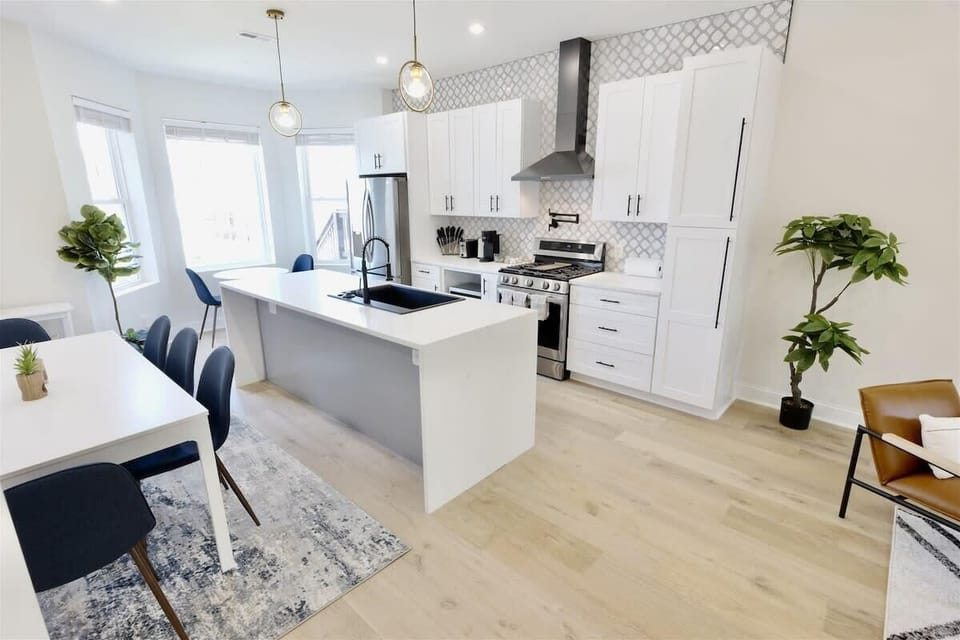 Full kitchen includes multiple seating areas and all modern appliances 