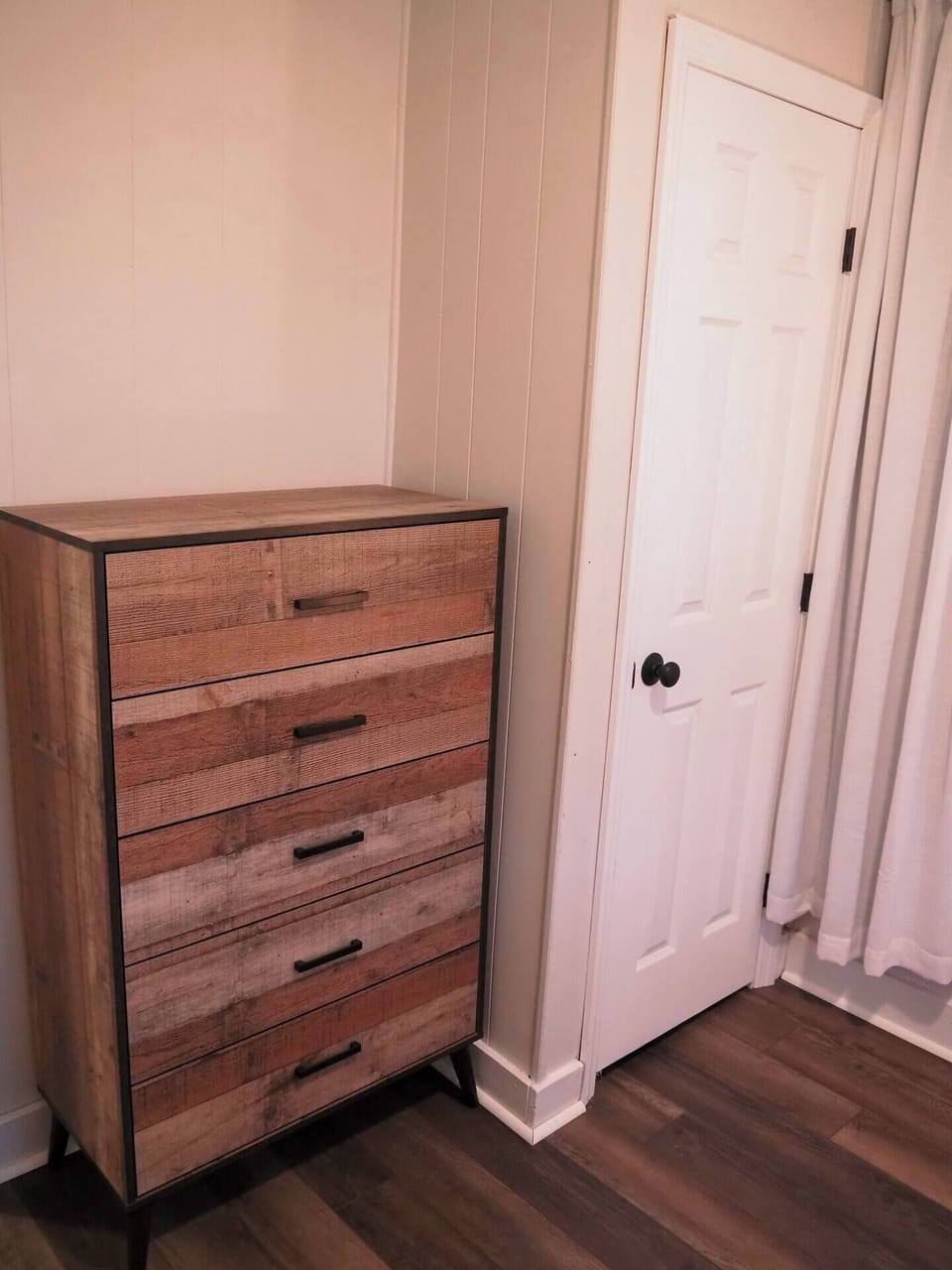 This dresser, in the second bedroom, holds sleeping materials for the pull out bed.