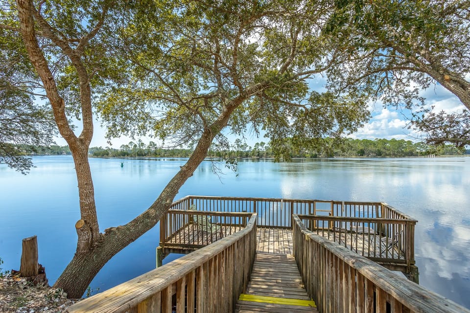Back yard view of river and dock