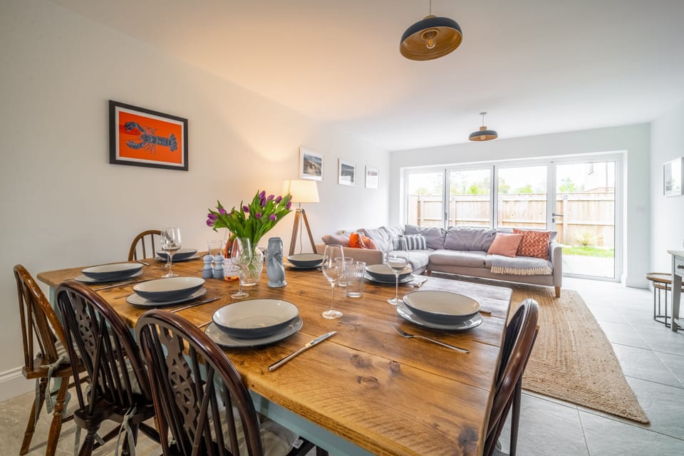 Ground floor: Dining room leading to garden room
