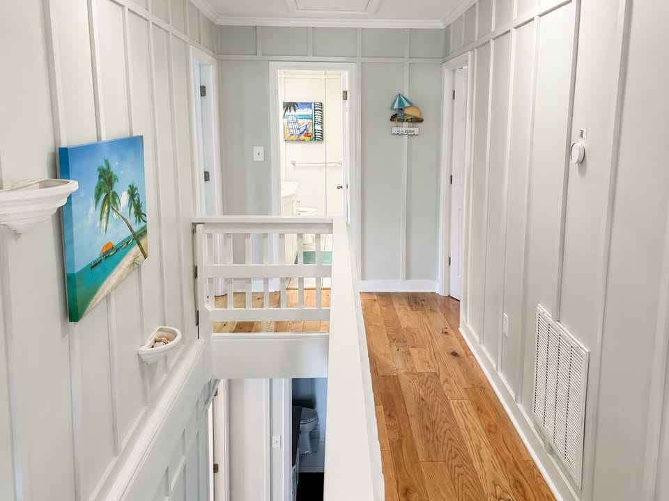 Loft area facing upstairs bath between two bedrooms