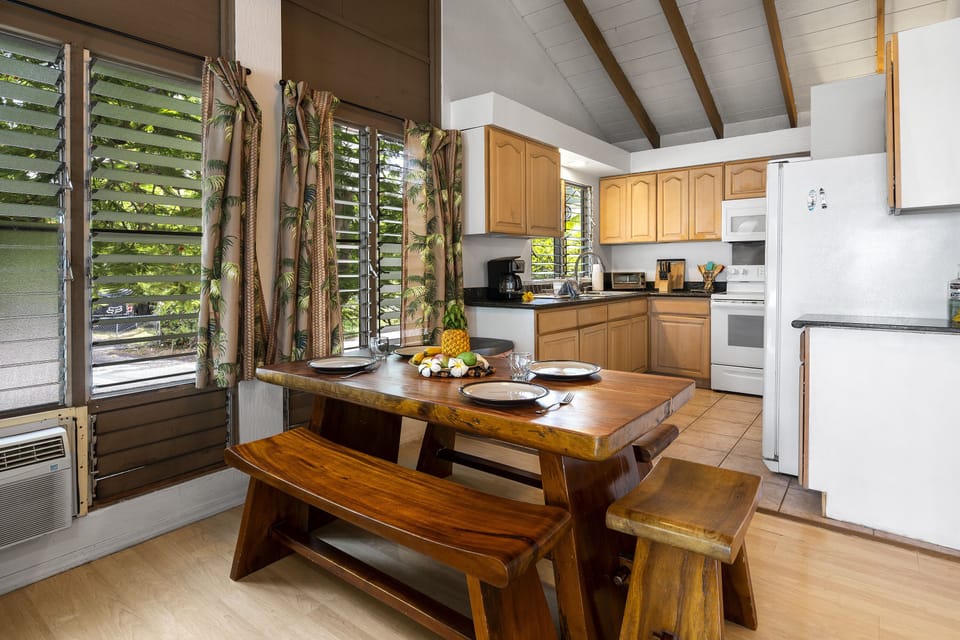 Enjoy a family meal in the Kona Surf House dining area