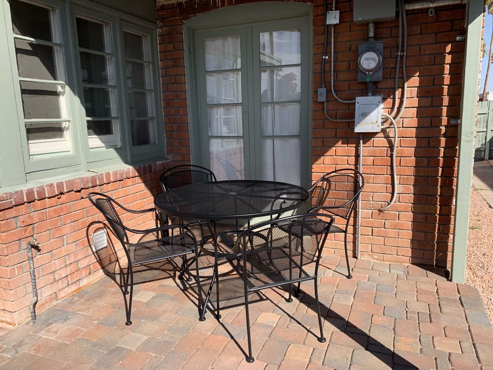Outdoor furniture on back patio