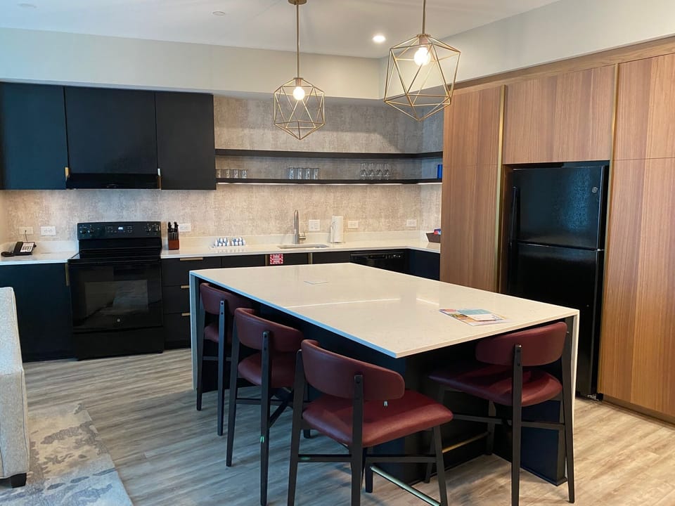 Kitchen, stocked and roomy. 4 person seating around the island