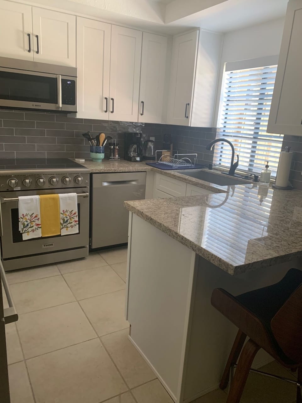 Kitchen with stainless upscale appliances.