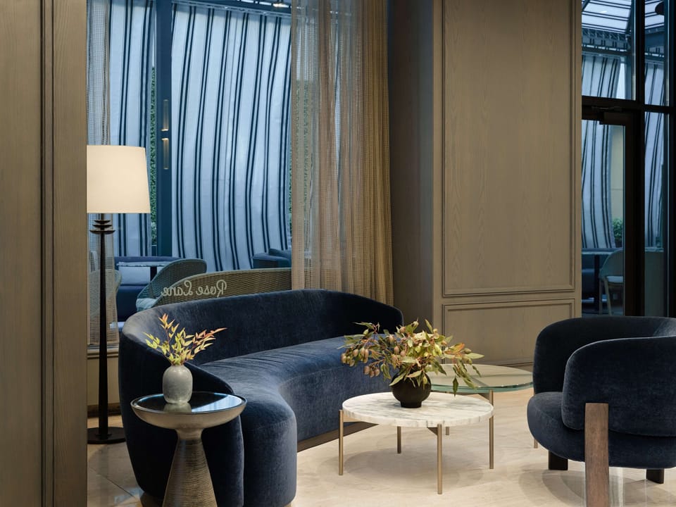 Settle in for cocktails and conversation on plush velvet seating.
