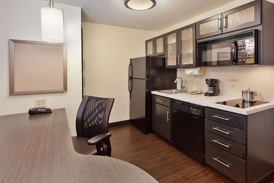 Cook with ease in the modern kitchenette with full appliances.