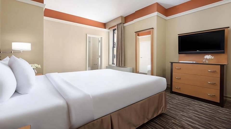 Settle in with a large TV and spacious dresser storage.