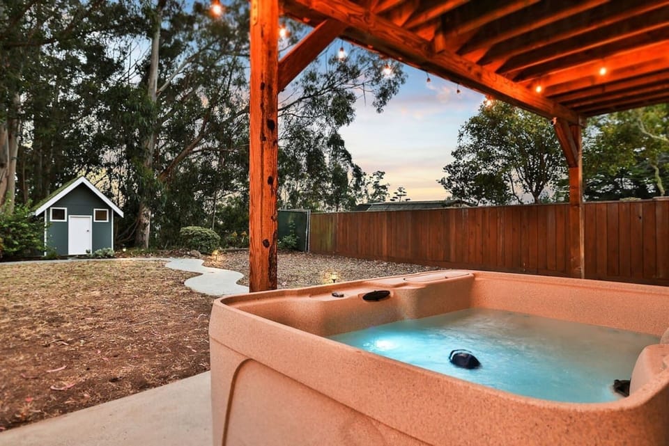 Sip a glass of wine while relaxing in our hot tub
