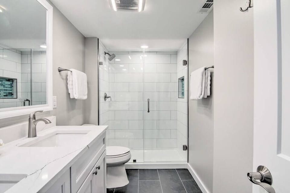 The primary bath was recently renovated and includes a double sink vanity and walk-in shower.