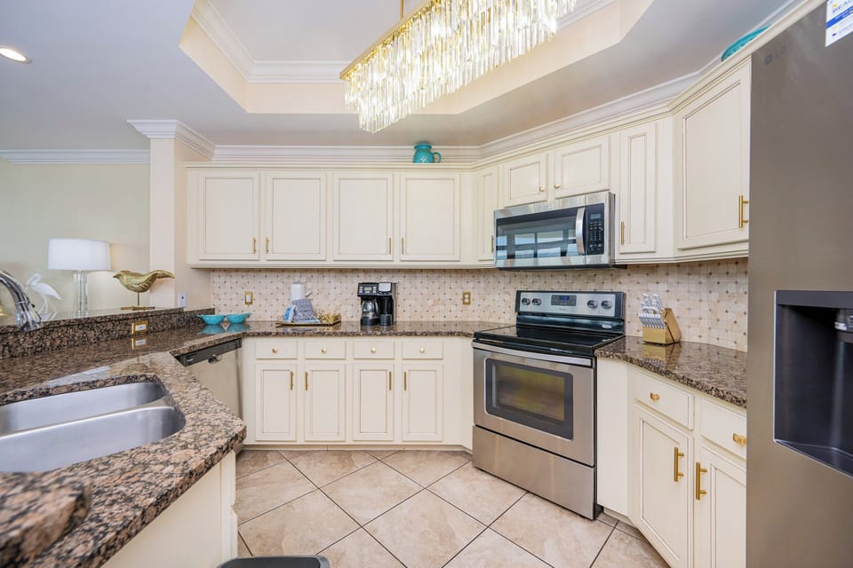 Craft delightful meals with family in the spacious kitchen, where the elegant design enhances your culinary experience