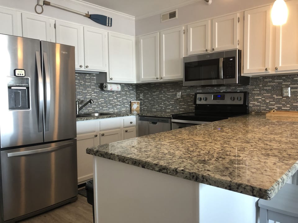 Complete with dishware, cookware, utensils, toaster, coffee maker, etc.