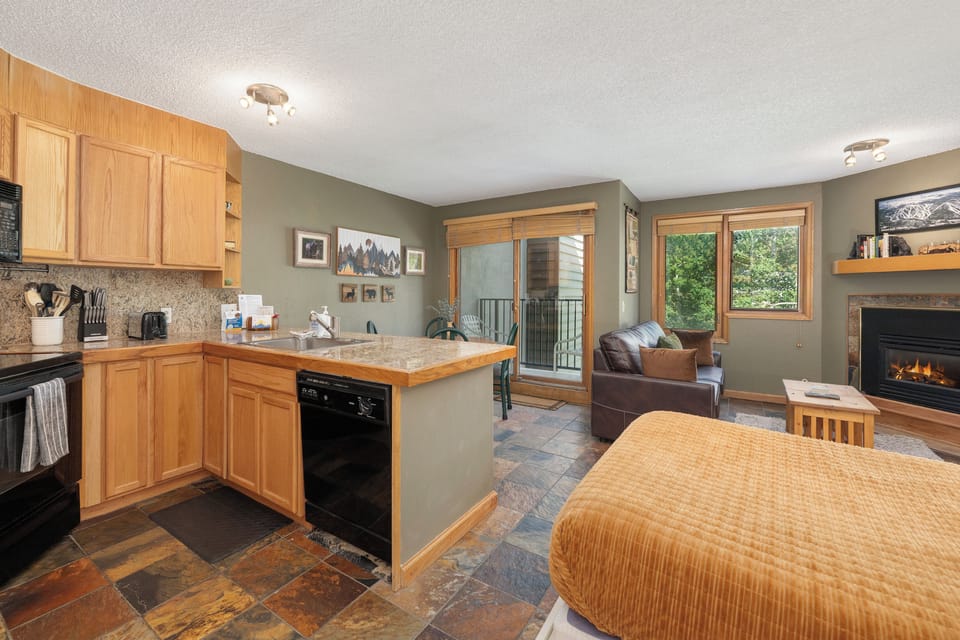 Bright and inviting view of the cozy studio room.