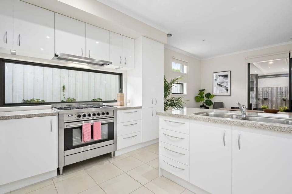 The kitchen is designed for both style and functionality