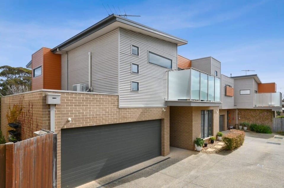 Experience exclusive coastal living at this modern townhouse, perfectly situated in the heart of Torquay