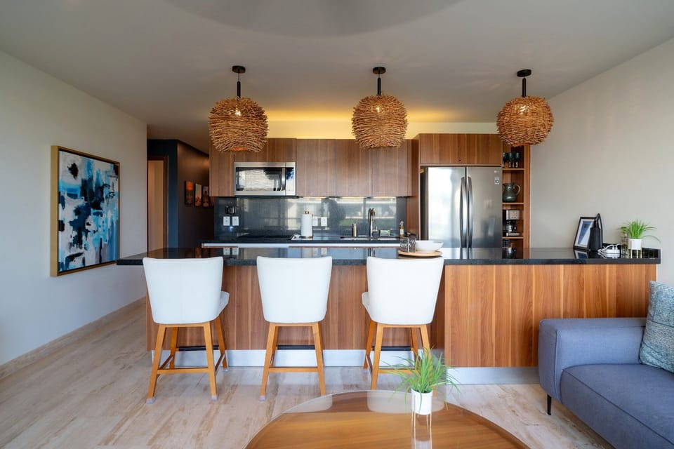 Modern kitchen with a large island and seating for casual meals.
