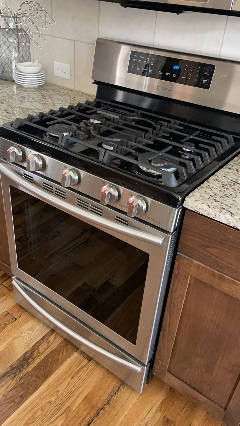 Gas stove oven with convection microwave above