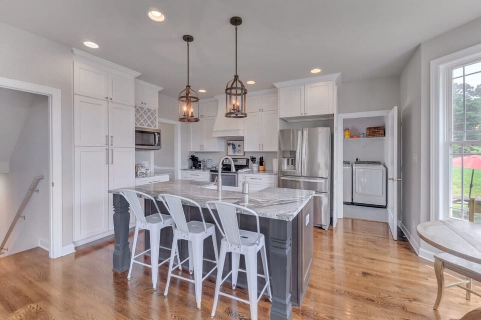 The kitchen is large, well-stocked, and clean, ready for your group meal preparation