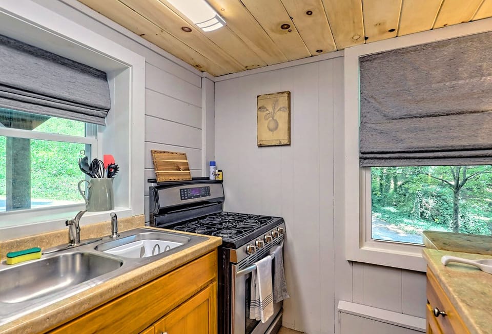 Views of the lovely kitchen with all stainless steel appliances and gas range.