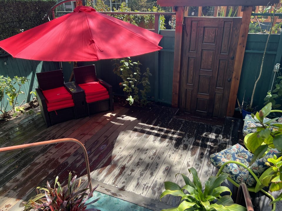 your private decked front garden