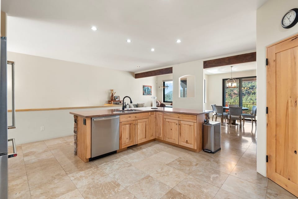 Fully stocked and thoughtfully designed, this spacious kitchen is perfect for group cooking and entertaining.
