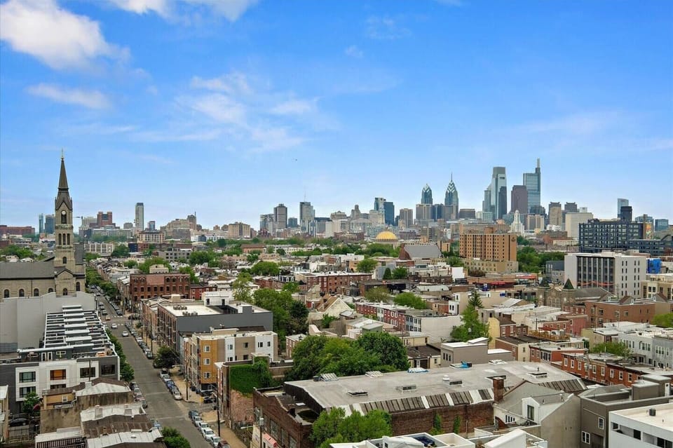 Philadelphia city skyline view from rooftop showcasing downtown high-rises and urban landscape.