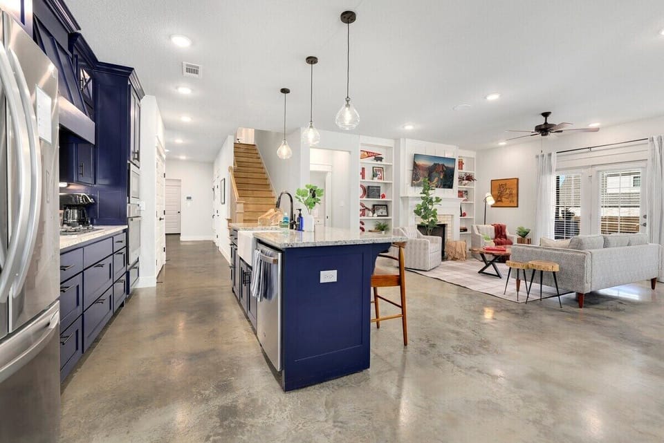 Directly to the left of the living room, you'll enter our kitchen.