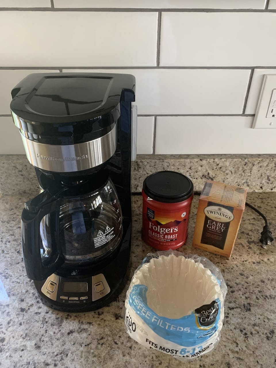 Coffee, coffee filters, and coffee maker provided.  Tea too.