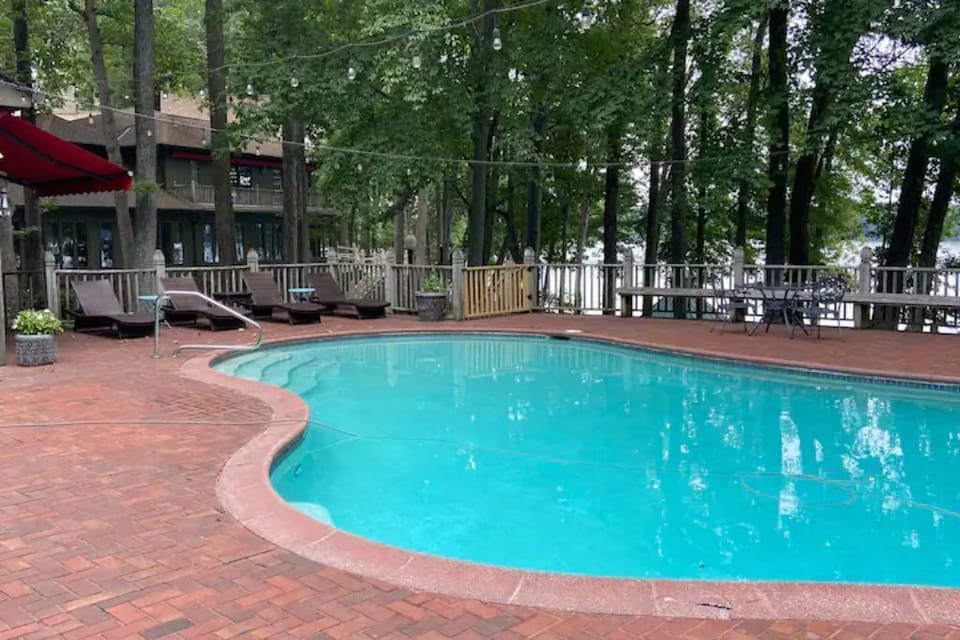 The pool overlooking the beautiful Swift Creek Reservoir, lounge chairs & tables