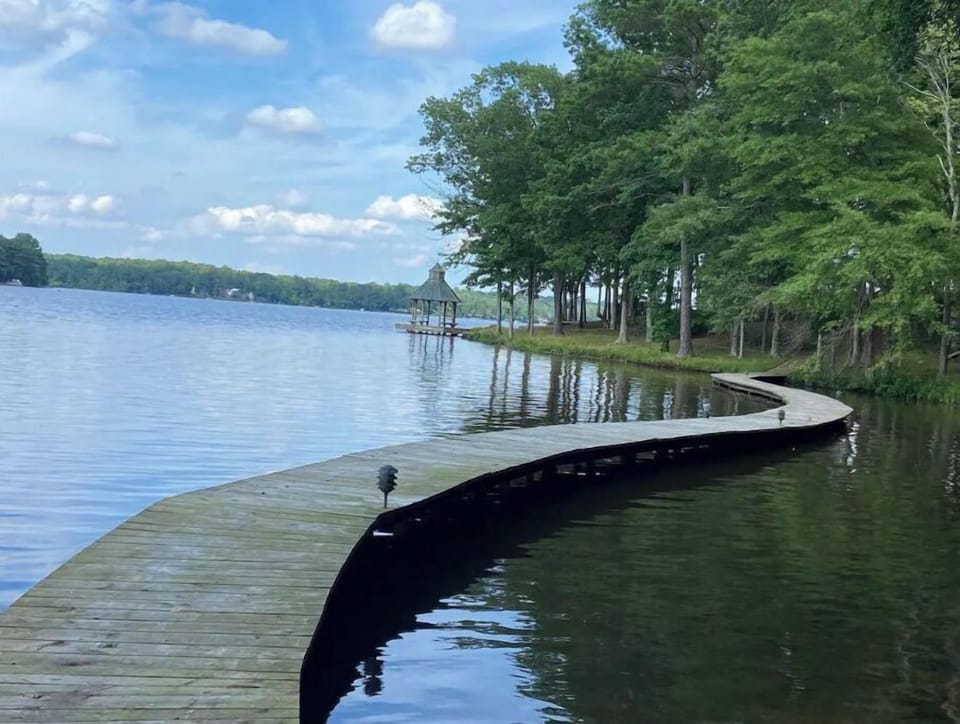 The floating pier walkway leading to "Herons perch" gazebo, trails and gardens.