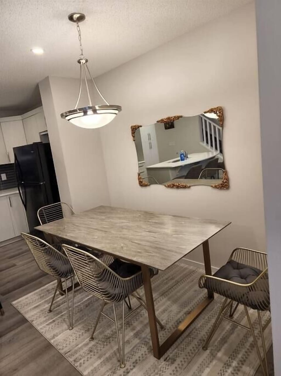 Dining area in Living area with a table nearby kitchen