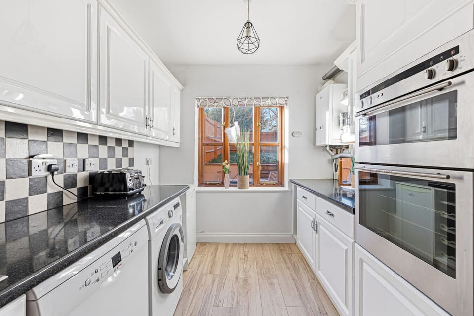 Enjoy a fully equipped kitchen with everything you need for a comfortable stay, including a fridge-freezer, oven, hob, microwave, dishwasher, kettle, toaster, and complete cookware and dining essentials.