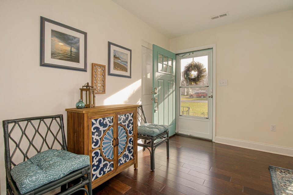 Our front door is open for you. There's a highchair, booster seat, and umbrellas in the coat closet.