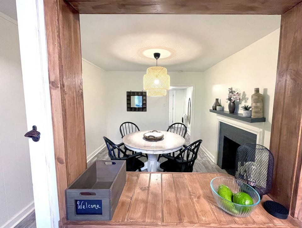 Pass through from kitchen into dining room. Two stools at the pass through also.