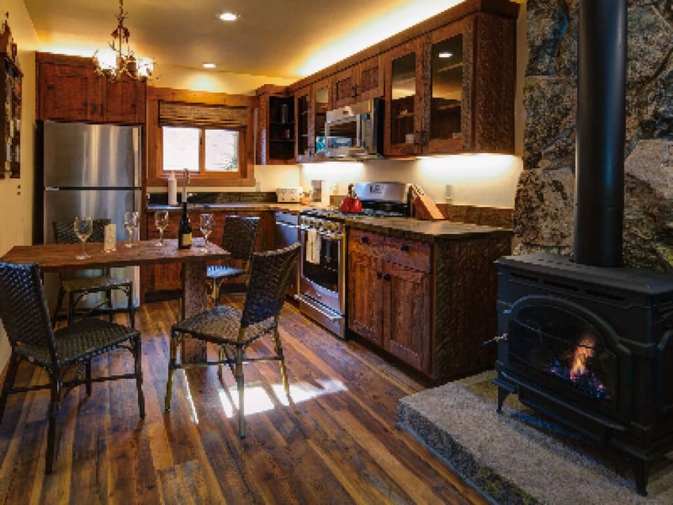 Kitchen: open floor plan, stainless steel appliances, dishwasher, beautiful custom made cabinets and  granite counter-tops.