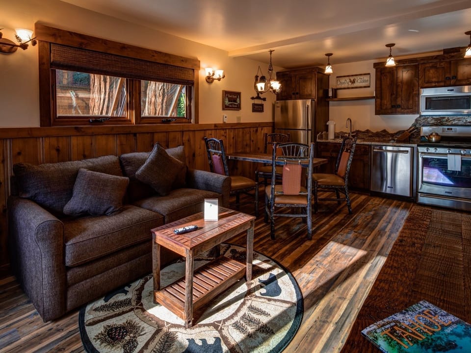 Unit #8: oversized stainless steel appliances, dish washer, granite counter-tops, custom made cabinets, hard floors, and more!