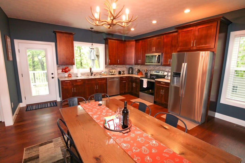 Brand new appliances. Fully stocked kitchen. Sitting for up to 12 guests.