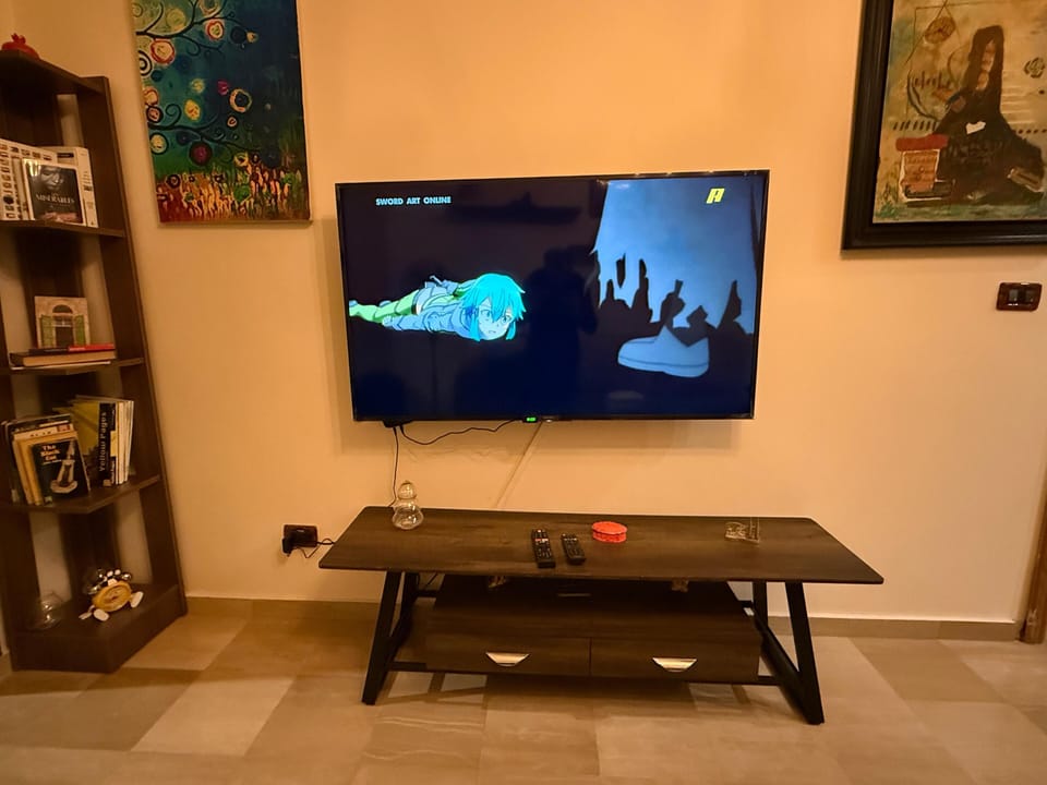 65" TV in Living room 