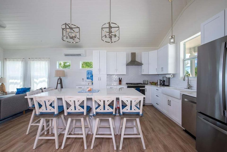 The large quartz-topped island has seating for six.