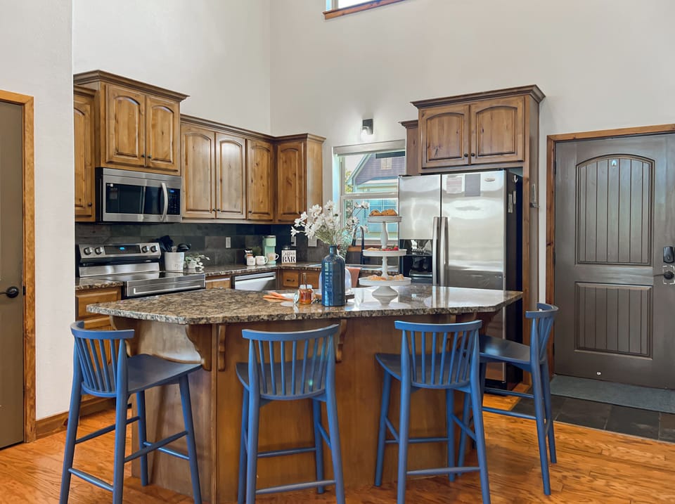 Cook up a storm in this well-stocked kitchen, complete with modern appliances and plenty of counter space.