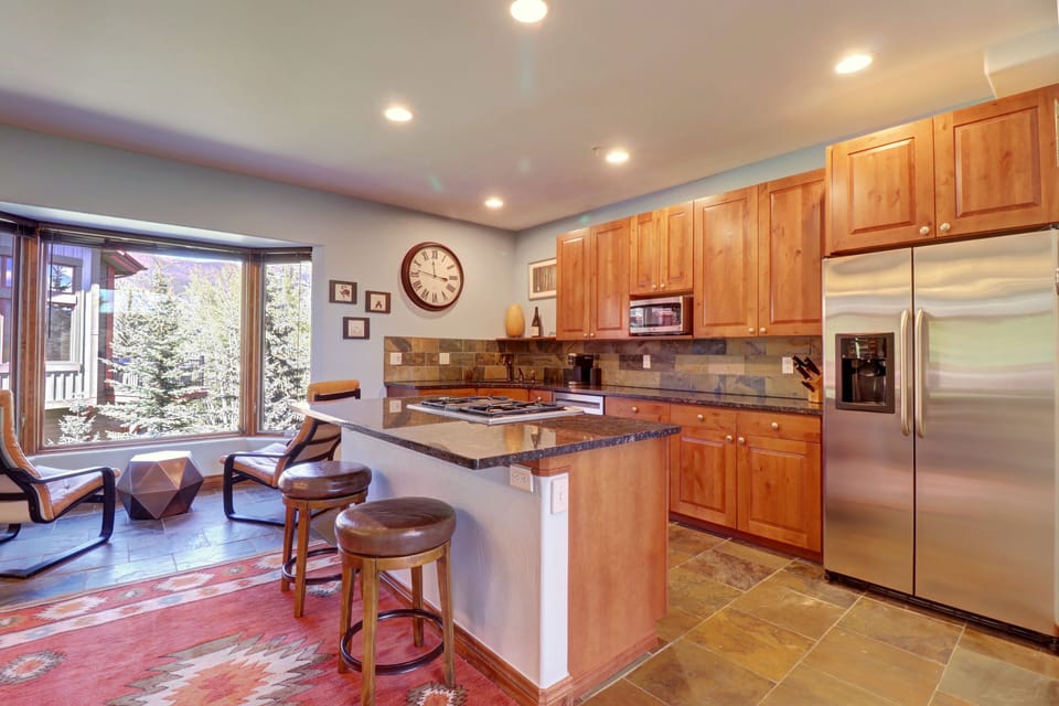 Nicely updated kitchen featuring barstool seating