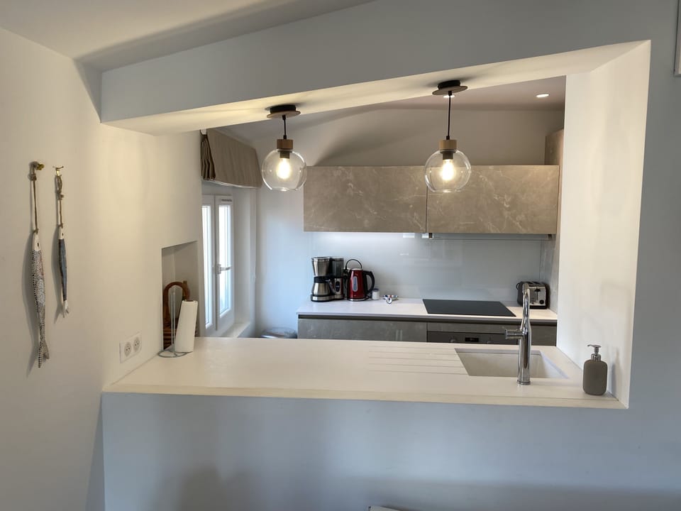 View to kitchen from living room.