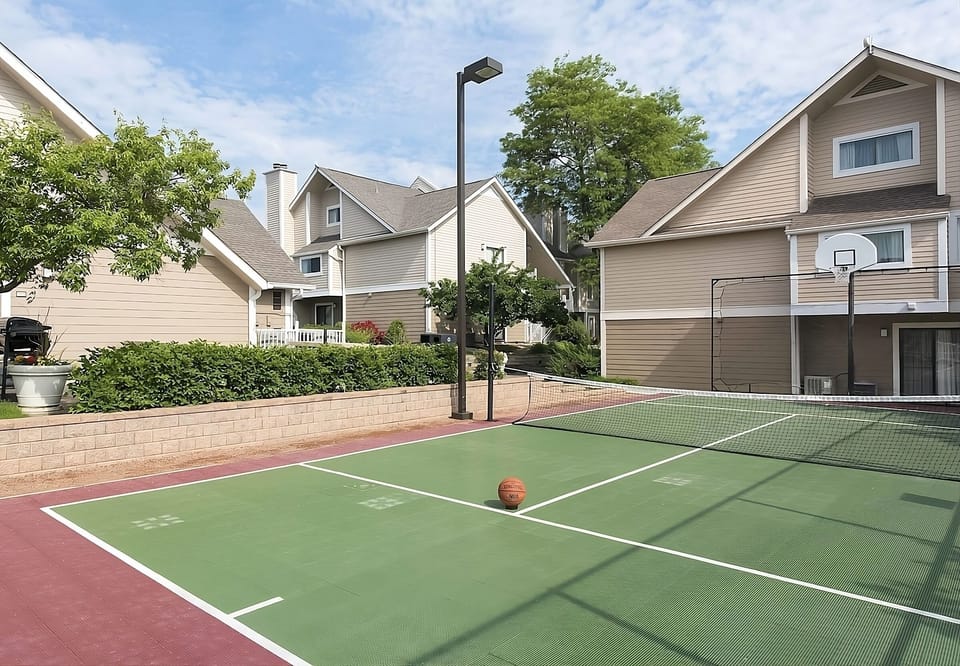 Challenge friends to a sunny match on the sport court.