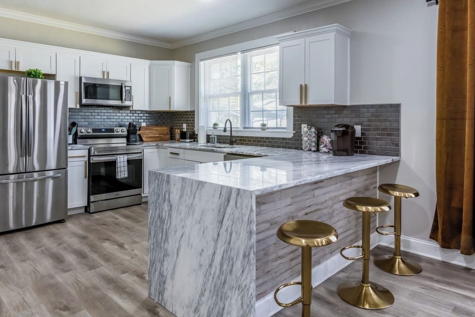 Fully equipped kitchen with stainless steel appliances and every cooking or baking utensil you  may need.