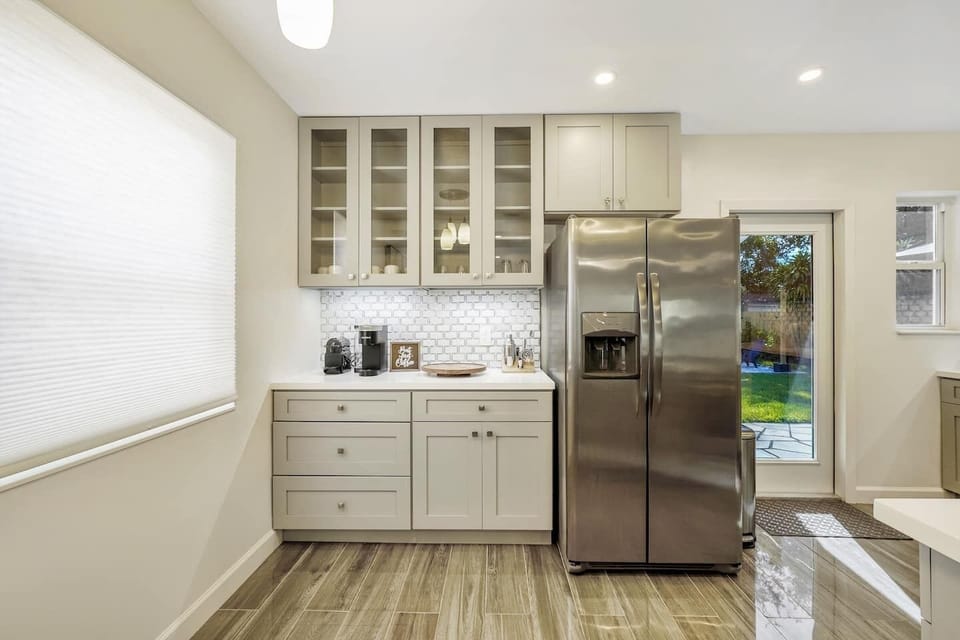 coffee station right beside the refrigerator