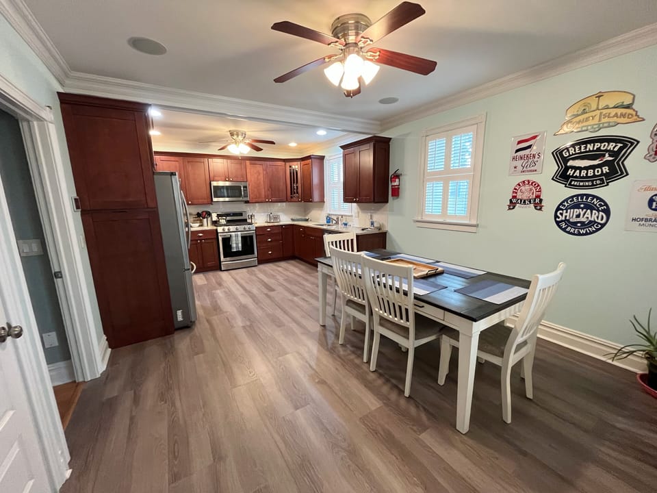 Eat-in kitchen with doors to front porch
