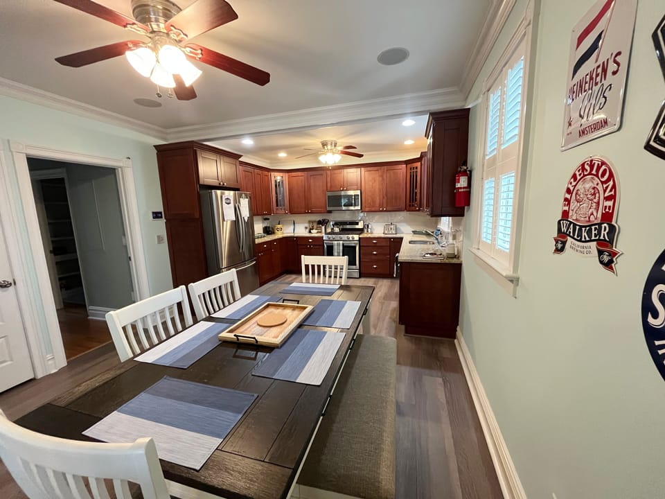 Eat-in kitchen with doors to front porch