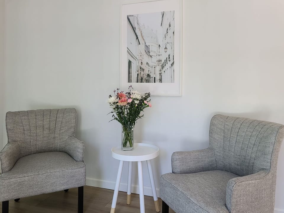 The entryway has comfortable seating