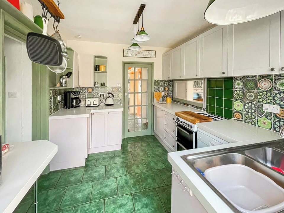 kitchen taken from doorway into downstairs loo | Thornlea, Whitby
