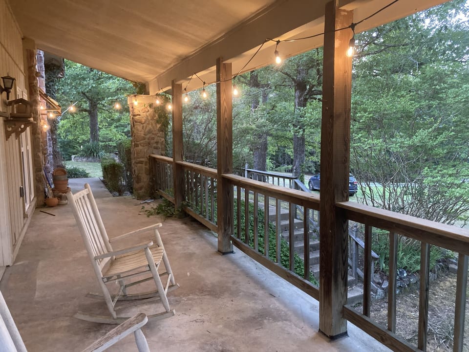 The rustic front porch at the Grotto is the perfect place to relax.
